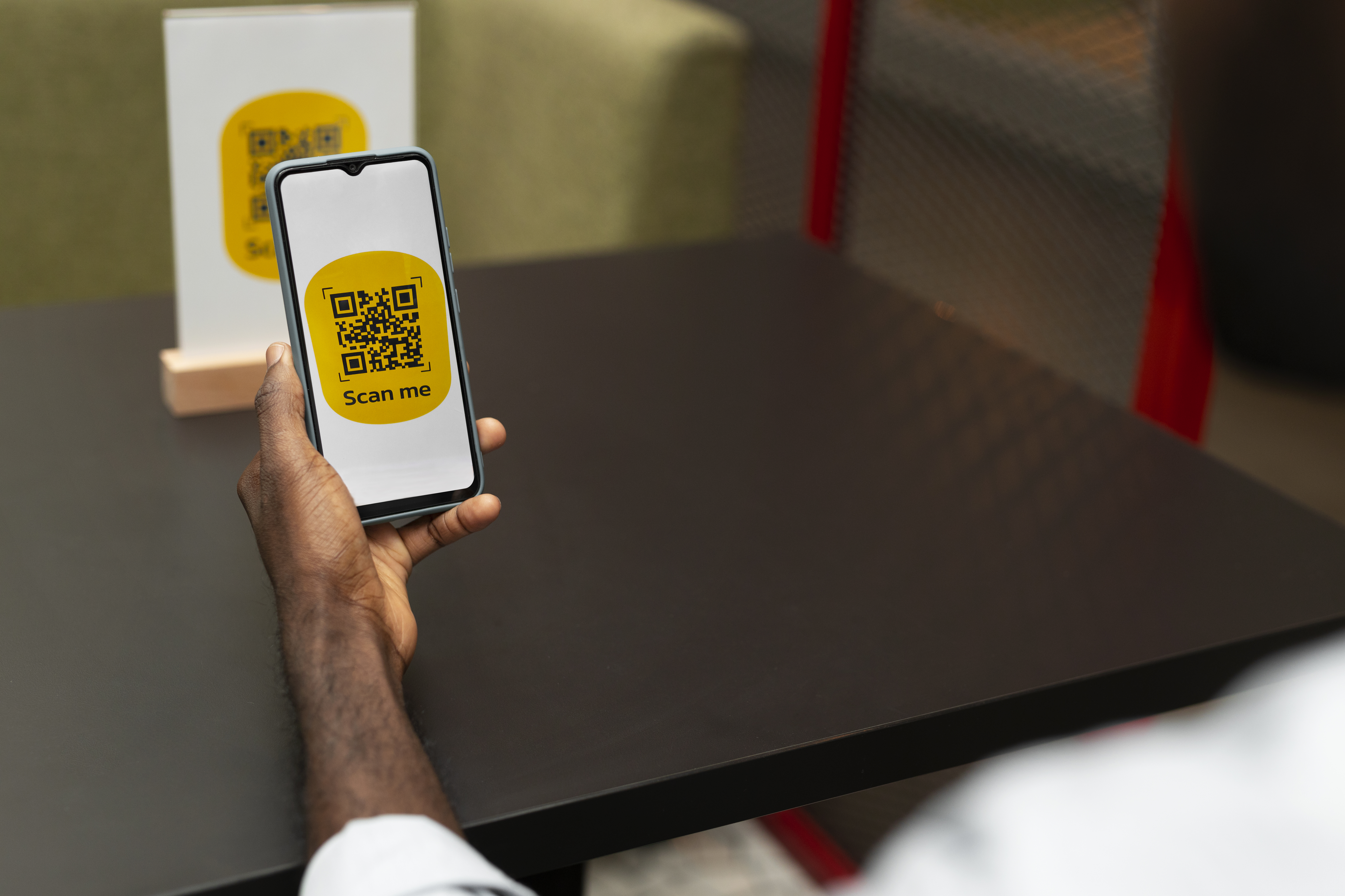 Customer Scanning QR Code with Smartphone